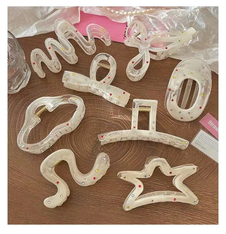 CuteHart Star Bow Shaped Hair Claw Clip - Sparkling Milky White Rhinestone Design 1pc 闪耀彩钻装饰的奶白色星形蝴蝶结抓夹