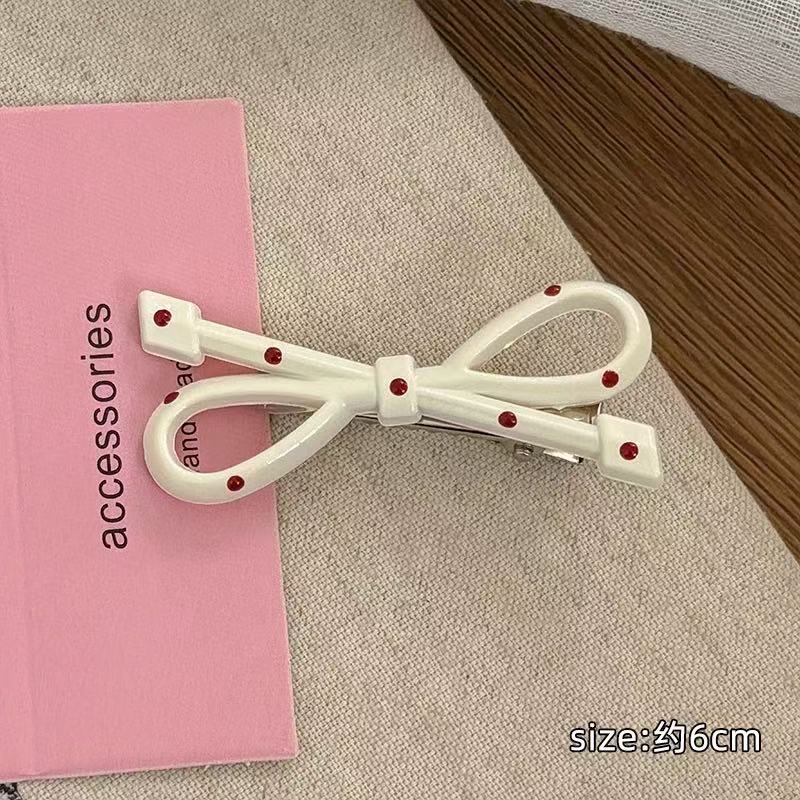 CuteHart Polka Dot Bow Hair Clip - Sweet and Chic Hair Accessory for Everyday Style 2pcs 波点蝴蝶结发夹甜美时尚的日常发饰